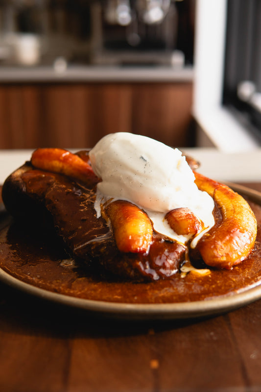 PANDORO FRENCH TOAST WITH CARAMELIZED BANANAS, RUM & VANILLA ICE CREAM