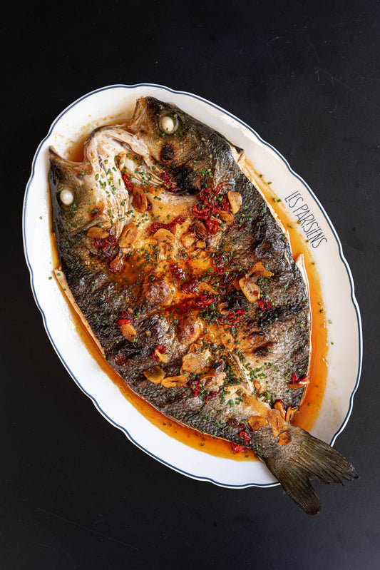 BUTTERFLY SEA BASS, GARLIC-CHILI SHERRY VINAIGRETTE