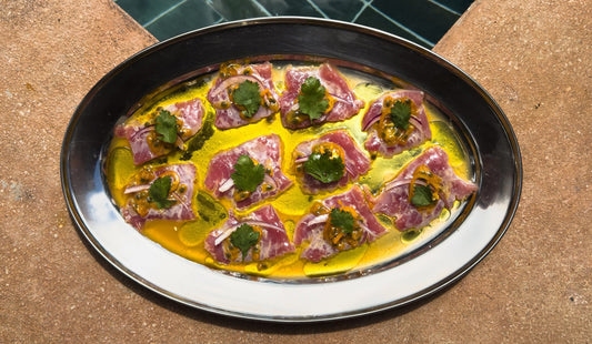 YELLOWFIN TUNA CRUDO WITH PASSION FRUIT & LIME
