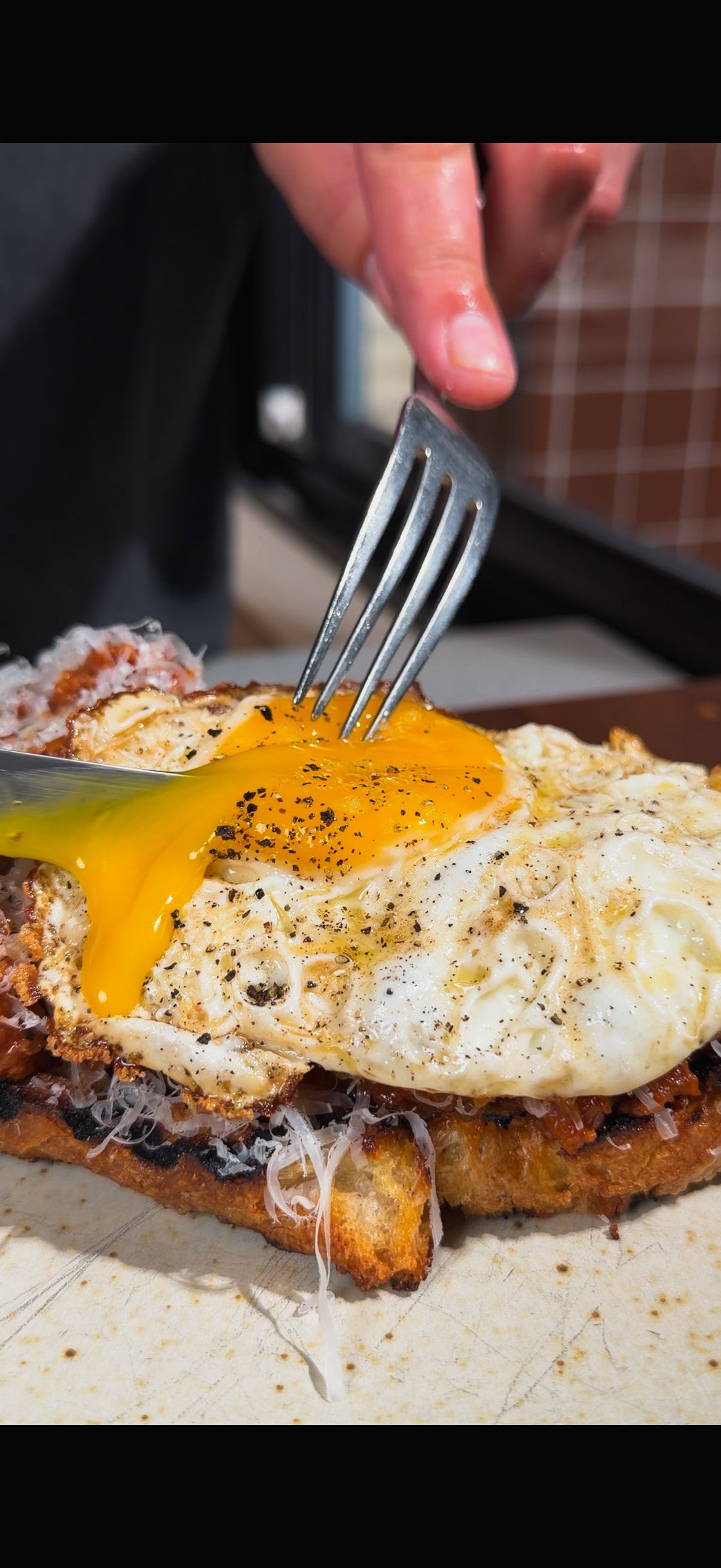 SAUSAGE RAGÙ ON TOAST WITH FRIED EGG