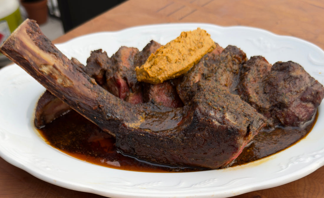 60-DAY DRY-AGED TOMAHAWK WITH CAFÉ DE PARIS BUTTER & CORN RIBS