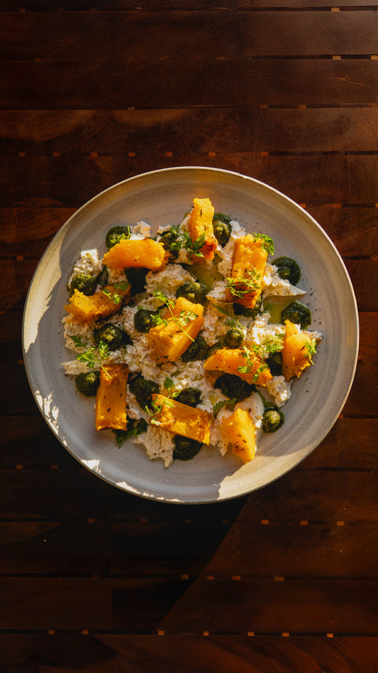 ROASTED BANANA SQUASH WITH TOASTED SEED PESTO AND BURRATA