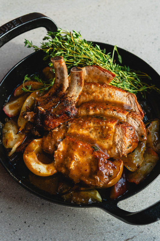 DOUBLE PORK CHOP WITH ROASTED APPLES, PEARS & CALVADOS SAUCE