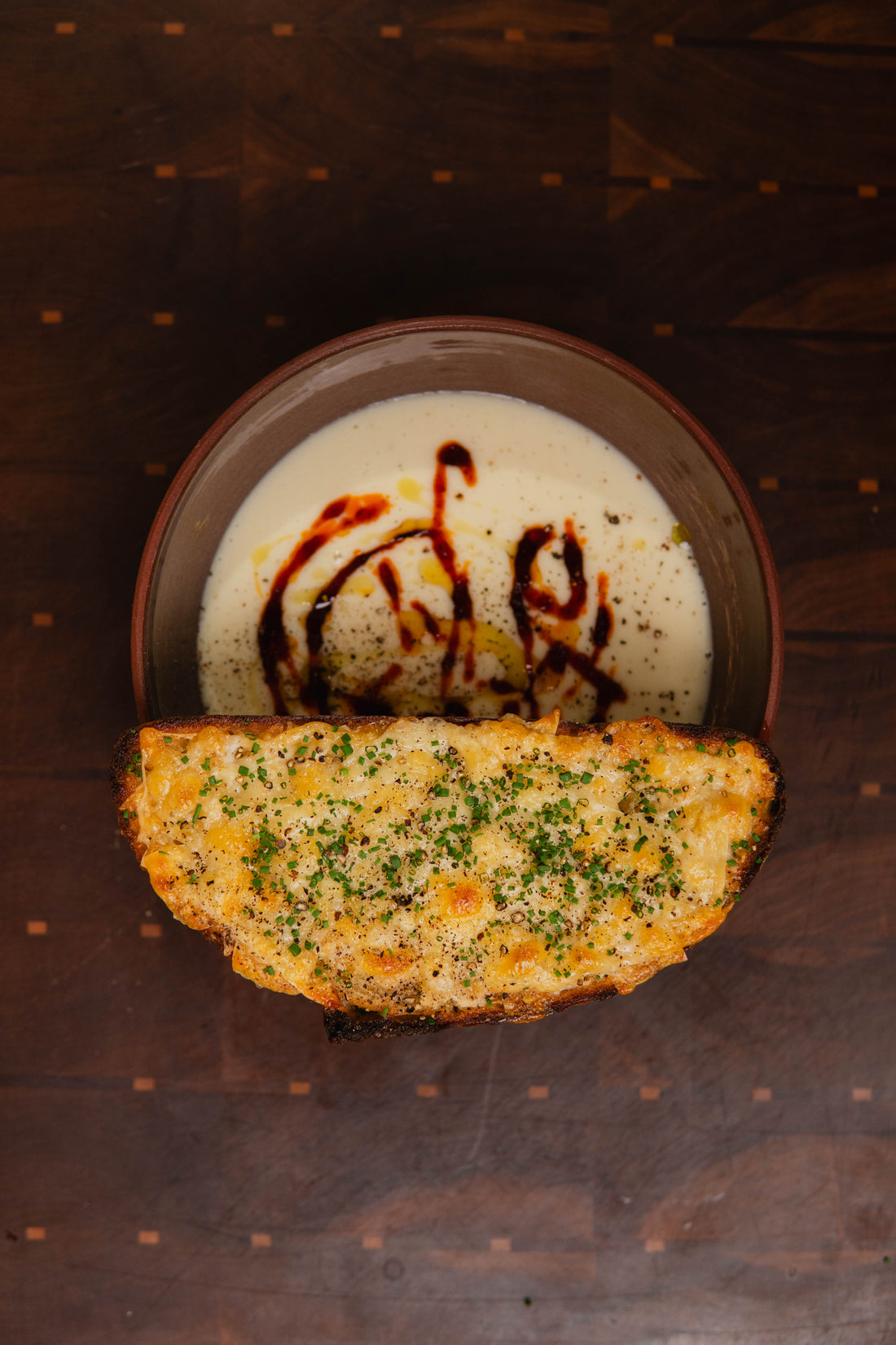 POTATO SOUP WITH NDUJA HONEY & GRUYÈRE TOAST